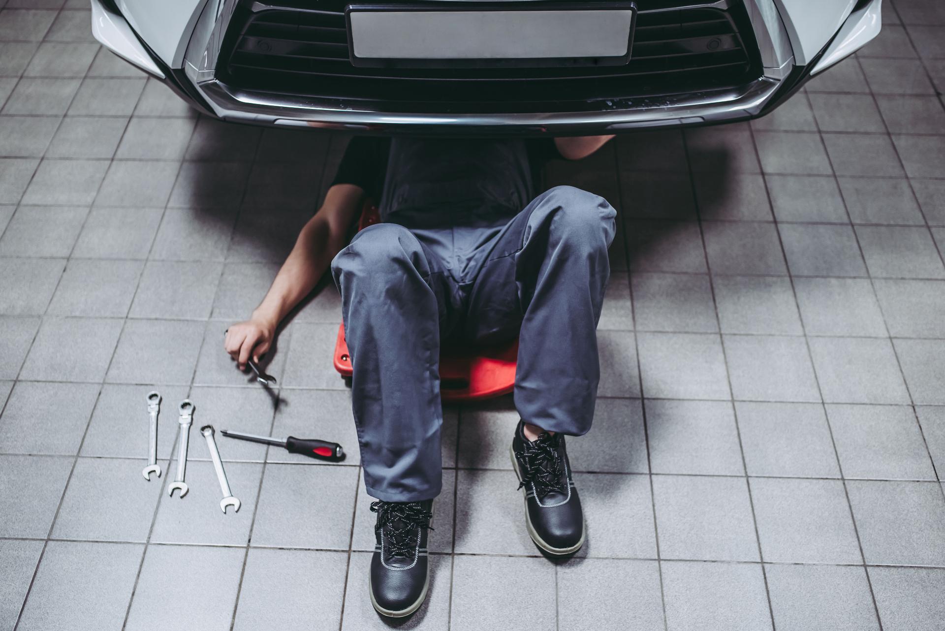 Handsome auto service mechanics.
